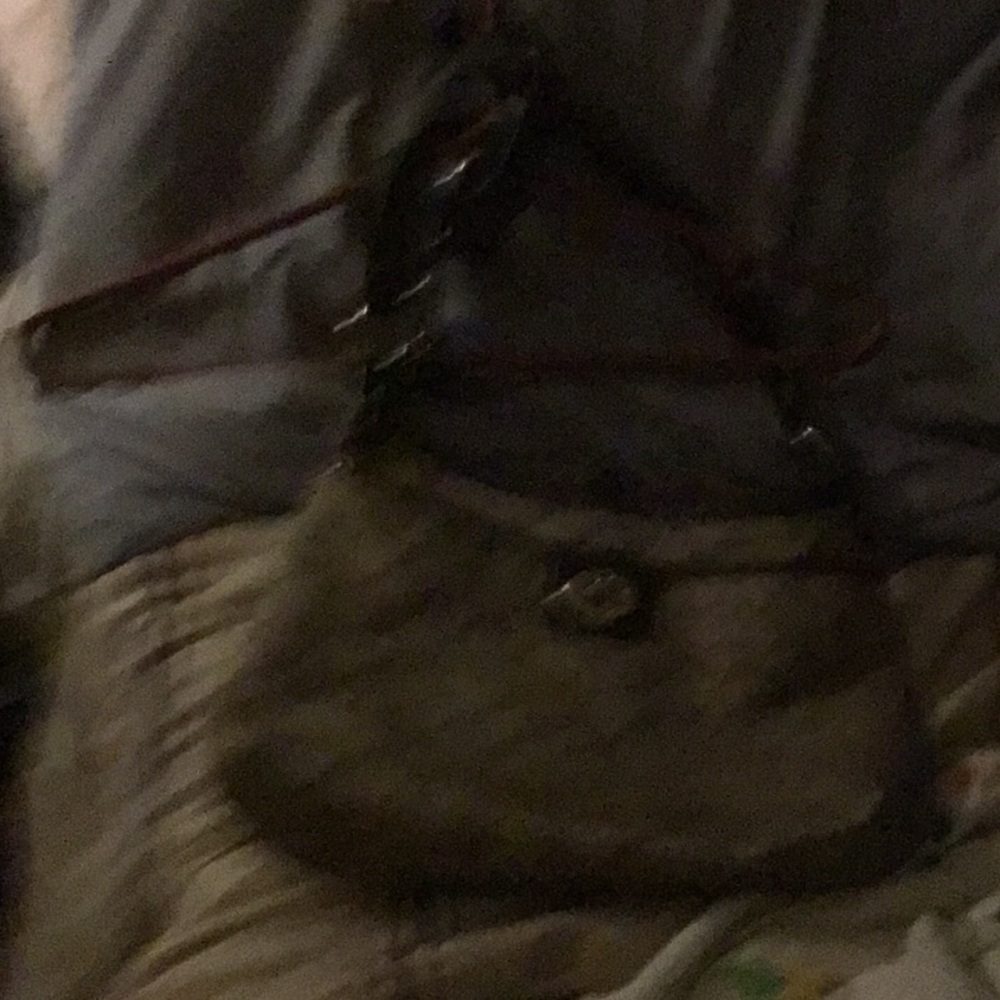 Coach purse with leather trim. 20dollars. Great condition. Very clean.